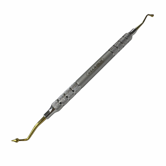 El bruñidor en titanio cabeza de pato marca Delta. Disponible en ForDental.